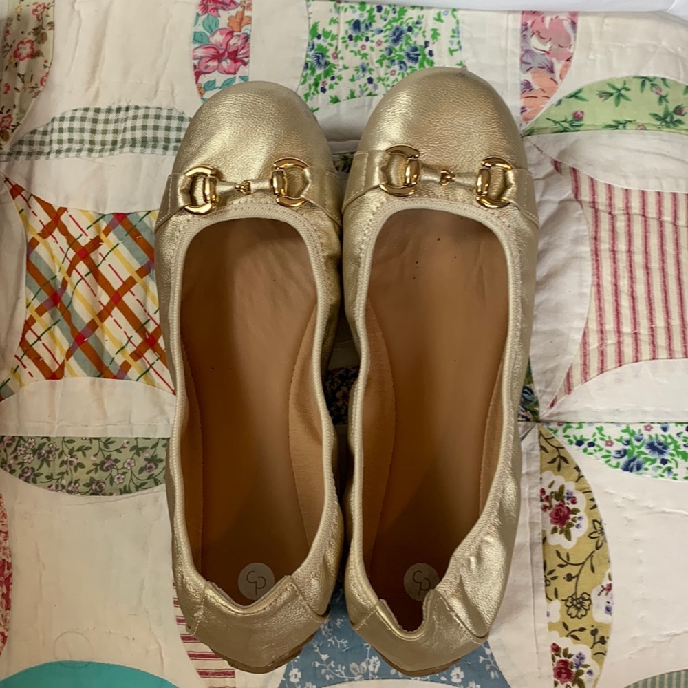 Dressbarn shoes size 10 flats. Worn once. Pretty gold shoe.